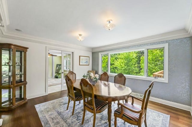 205 Kummrow Ct, Wales, WI 53183 - dining area featuring wood finished floors and ornamental molding