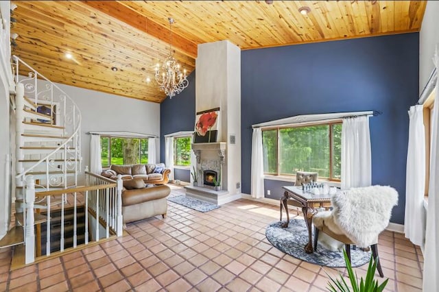 205 Kummrow Ct, Wales, WI 53183 - living room featuring wooden ceiling, stairway, high vaulted ceiling, a chandelier, and a lit fireplace