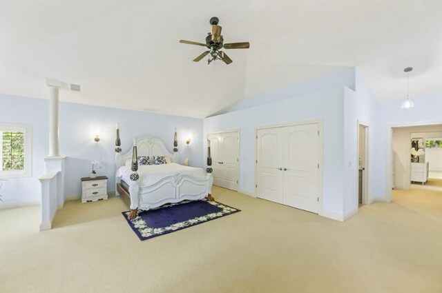 205 Kummrow Ct, Wales, WI 53183 - bedroom featuring carpet floors, multiple closets, lofted ceiling, and ceiling fan