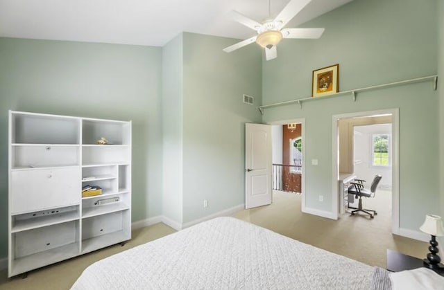 205 Kummrow Ct, Wales, WI 53183 - carpeted bedroom with a towering ceiling, an office area, and a ceiling fan