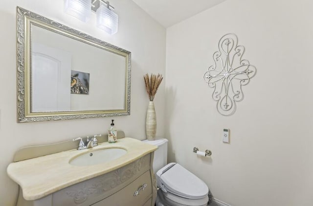 205 Kummrow Ct, Wales, WI 53183 - half bathroom featuring vanity and toilet