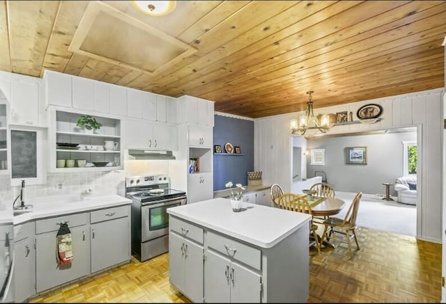 205 Kummrow Ct, Wales, WI 53183 - kitchen with stainless steel electric range, wooden ceiling, under cabinet range hood, gray cabinetry, and open shelves