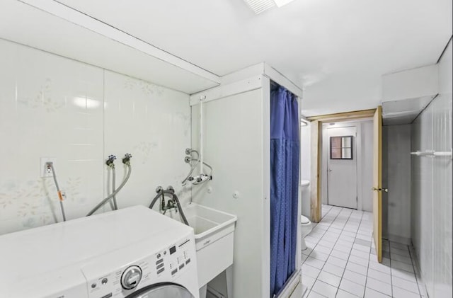 205 Kummrow Ct, Wales, WI 53183 - laundry room with washer / dryer and light tile patterned floors