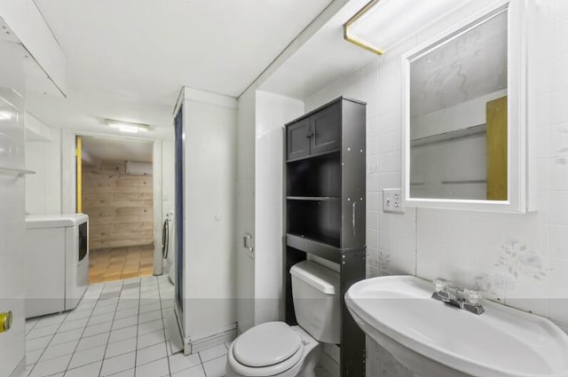 205 Kummrow Ct, Wales, WI 53183 - bathroom with washer / clothes dryer and tile patterned floors