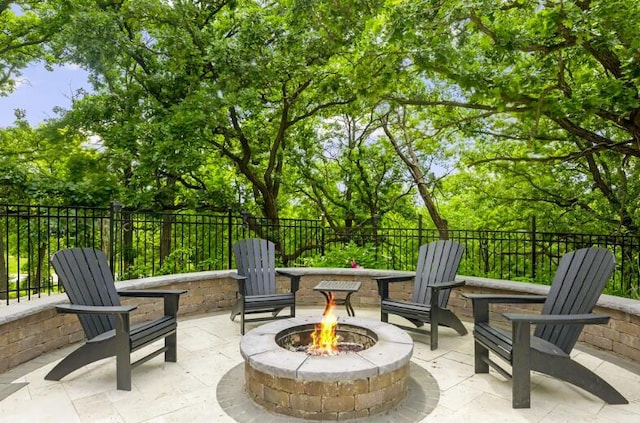 205 Kummrow Ct, Wales, WI 53183 - view of patio featuring an outdoor fire pit