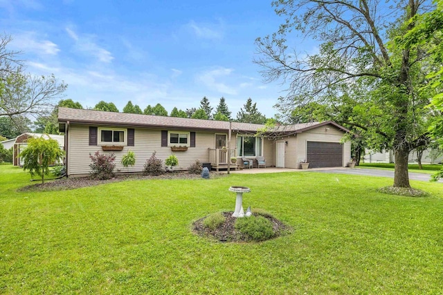 222531 Azalea Rd, Wausau, WI 54401 - single story home featuring driveway, a garage, and a front lawn