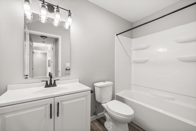 6611 Conner Davis Dr, Wausau, WI 54401 - bathroom with vanity, wood finished floors, and shower / washtub combination