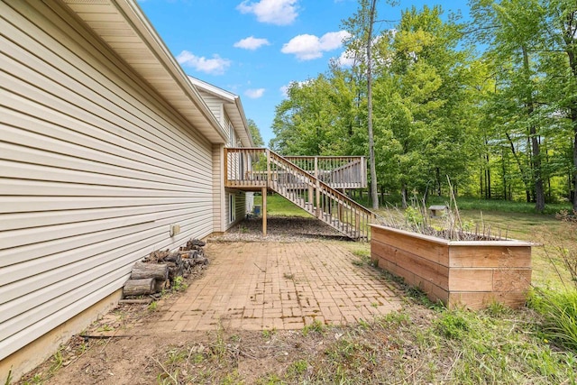 6611 Conner Davis Dr, Wausau, WI 54401 - view of patio featuring stairway and a wooden deck