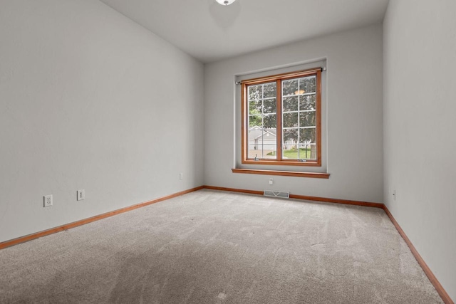 2506 Waterford Ct, Neenah, WI 54956 - spare room featuring light carpet