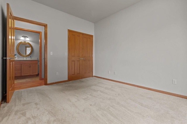2506 Waterford Ct, Neenah, WI 54956 - unfurnished bedroom with light carpet and ensuite bath