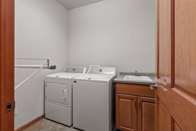2506 Waterford Ct, Neenah, WI 54956 - laundry room featuring washer and dryer and cabinet space