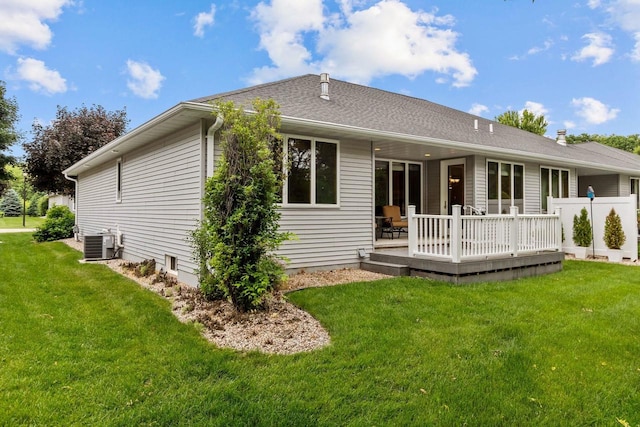 2506 Waterford Ct, Neenah, WI 54956 - back of house featuring a deck and a yard