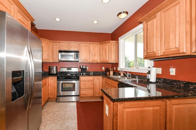 953 Eagleton Dr Unit 46-05, Lake Geneva, WI 53147 - kitchen with appliances with stainless steel finishes, a peninsula, recessed lighting, dark stone countertops, and light tile patterned floors