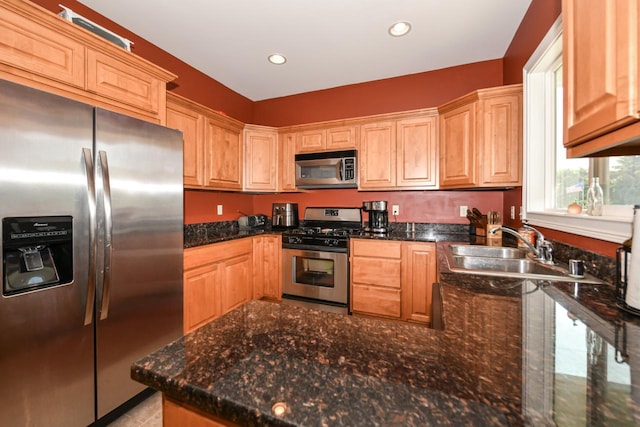 953 Eagleton Dr Unit 46-05, Lake Geneva, WI 53147 - kitchen with appliances with stainless steel finishes, recessed lighting, a peninsula, light brown cabinets, and dark stone counters
