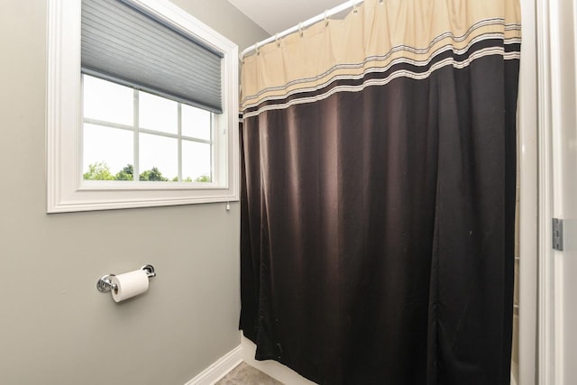 953 Eagleton Dr Unit 46-05, Lake Geneva, WI 53147 - full bath featuring baseboards and a shower with shower curtain