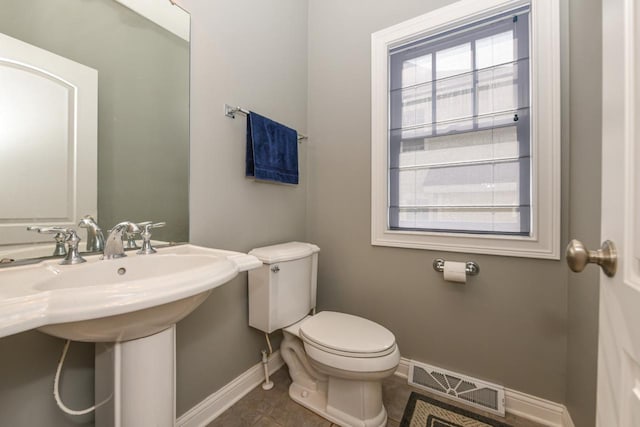 953 Eagleton Dr Unit 46-05, Lake Geneva, WI 53147 - half bathroom with plenty of natural light and tile patterned floors