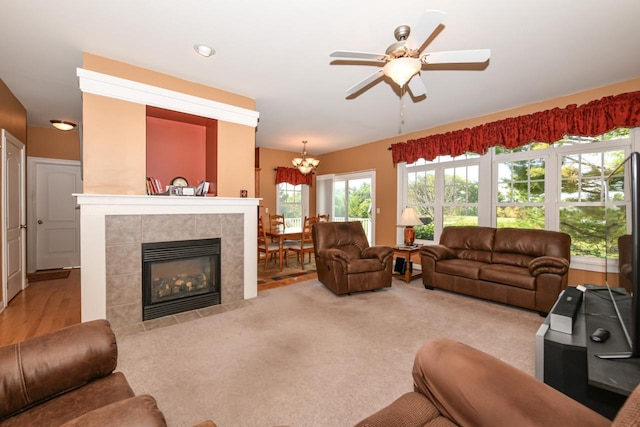 953 Eagleton Dr Unit 46-05, Lake Geneva, WI 53147 - living area with a chandelier, ceiling fan, a fireplace, and carpet floors