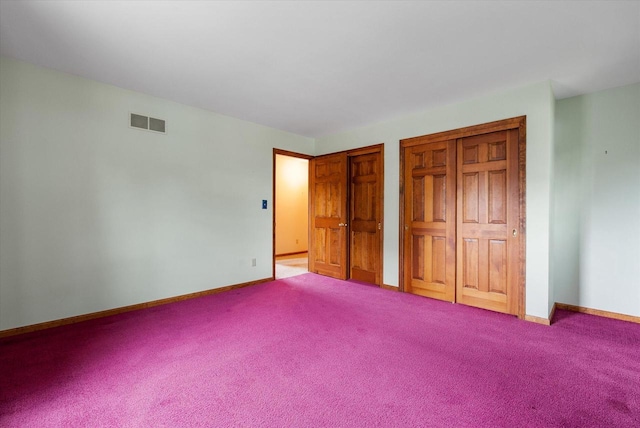10800 N Norway Dr, Mequon, WI 53092 - unfurnished bedroom with two closets and carpet flooring