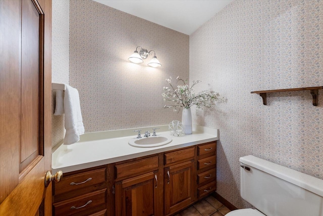 10800 N Norway Dr, Mequon, WI 53092 - bathroom with wallpapered walls, vanity, lofted ceiling, and tile patterned flooring