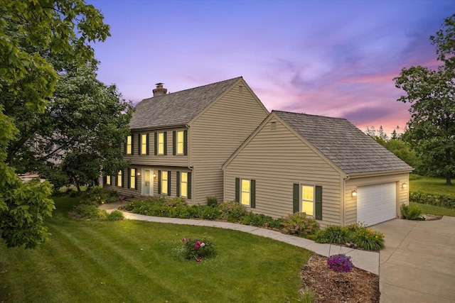 10800 N Norway Dr, Mequon, WI 53092 - view of front facade featuring a garage, a chimney, driveway, and a front yard