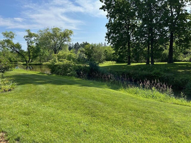 10800 N Norway Dr, Mequon, WI 53092 - view of grassy yard with a water view