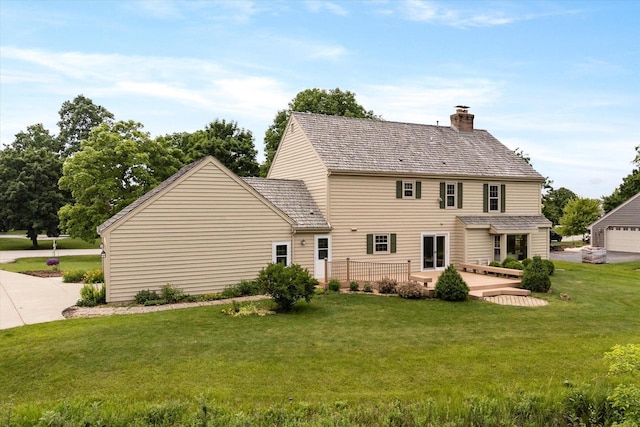 10800 N Norway Dr, Mequon, WI 53092 - rear view of house featuring a chimney and a yard