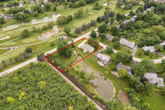 10800 N Norway Dr, Mequon, WI 53092 - aerial perspective of suburban area featuring a nearby body of water, property boundaries highlighted, and a golf course
