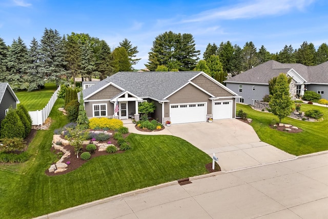 2210 Stoney Brook Dr, Manitowoc, WI 54220 - craftsman house with an attached garage and driveway