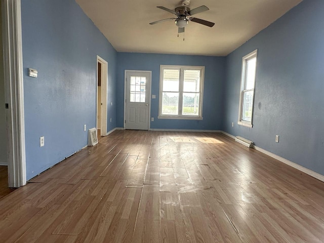 N133 Bartell St, Stephenson, MI 49887 - unfurnished living room with wood finished floors and a ceiling fan
