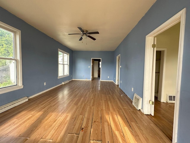 N133 Bartell St, Stephenson, MI 49887 - unfurnished room featuring a ceiling fan, wood finished floors, and baseboard heating