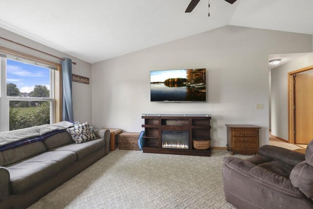 W5355 Linden Hill Dr, Appleton, WI 54915 - carpeted living room with ceiling fan, vaulted ceiling, and a glass covered fireplace
