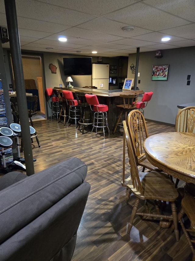 W5355 Linden Hill Dr, Appleton, WI 54915 - indoor dry bar featuring freestanding refrigerator, a drop ceiling, and wood finished floors