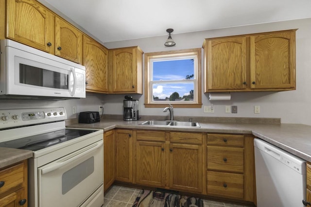 W5355 Linden Hill Dr, Appleton, WI 54915 - kitchen with white appliances, brown cabinetry, and tile patterned floors