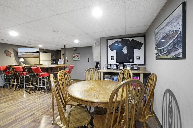 W5355 Linden Hill Dr, Appleton, WI 54915 - dining area with a dry bar, wood finished floors, and a drop ceiling