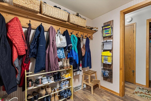 1021 Aspen Pl, West Bend, WI 53095 - mudroom featuring wood finished floors and wallpapered walls