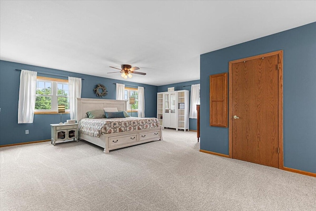 1021 Aspen Pl, West Bend, WI 53095 - bedroom with carpet and a ceiling fan