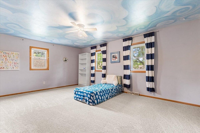 1021 Aspen Pl, West Bend, WI 53095 - bedroom with carpet, multiple windows, and ceiling fan