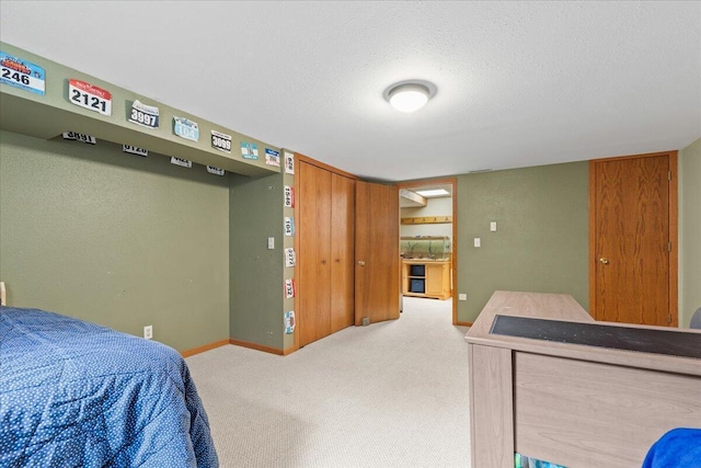 1021 Aspen Pl, West Bend, WI 53095 - bedroom with carpet floors and a textured ceiling
