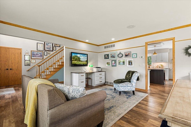 1021 Aspen Pl, West Bend, WI 53095 - living room with stairway, ornamental molding, and wood finished floors