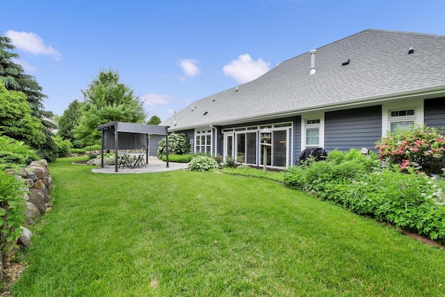 742 Charolais Dr, Slinger, WI 53086 - rear view of house featuring a patio, a yard, and roof with shingles