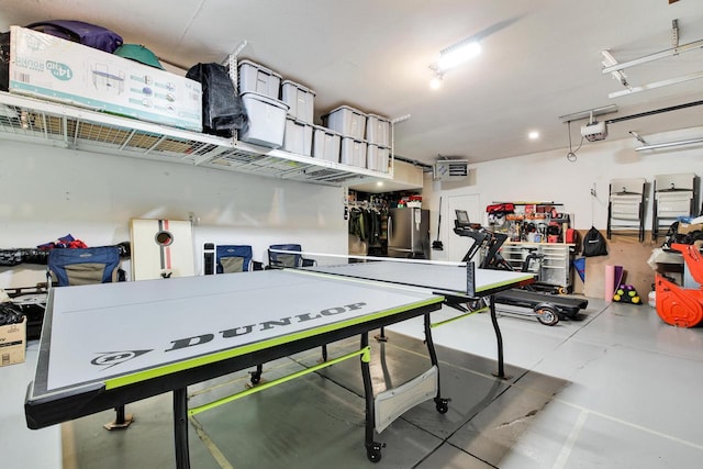 742 Charolais Dr, Slinger, WI 53086 - playroom featuring a garage and finished concrete floors