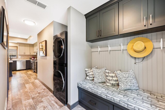 2830 Tomahawk Ct, Middleton, WI 53562 - washroom featuring stacked washing machine and dryer