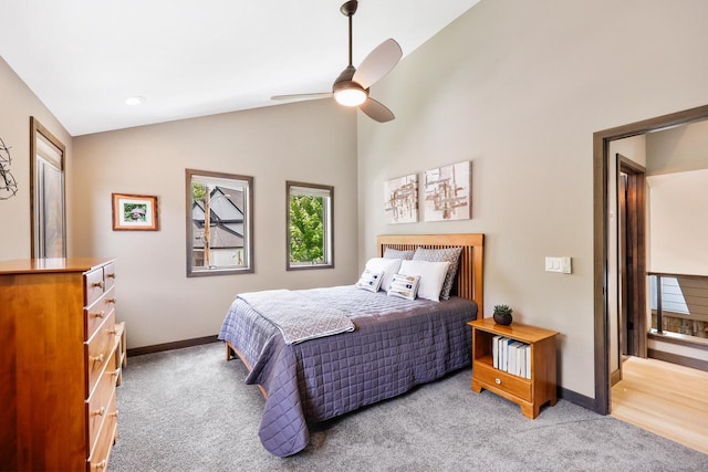 2830 Tomahawk Ct, Middleton, WI 53562 - bedroom featuring light carpet, vaulted ceiling, and ceiling fan