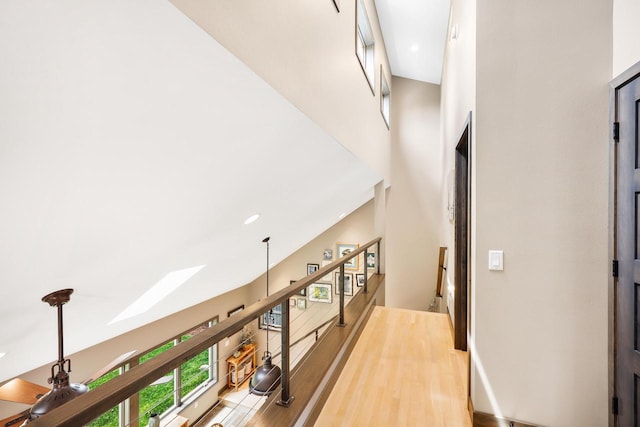 2830 Tomahawk Ct, Middleton, WI 53562 - hallway with wood finished floors and a high ceiling