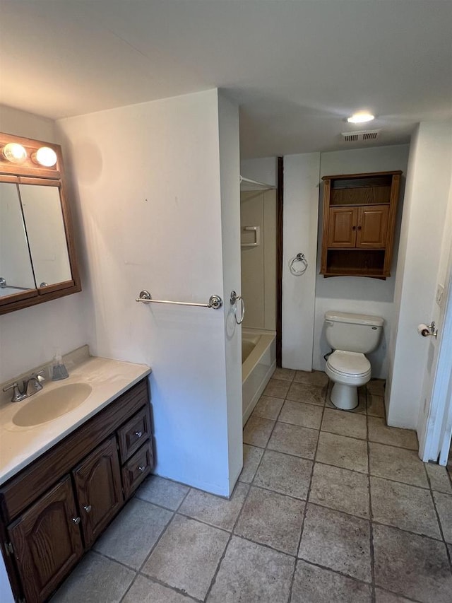 530 Wisconsin St, Columbus, WI 53925 - bathroom with vanity, washtub / shower combination, and tile patterned flooring