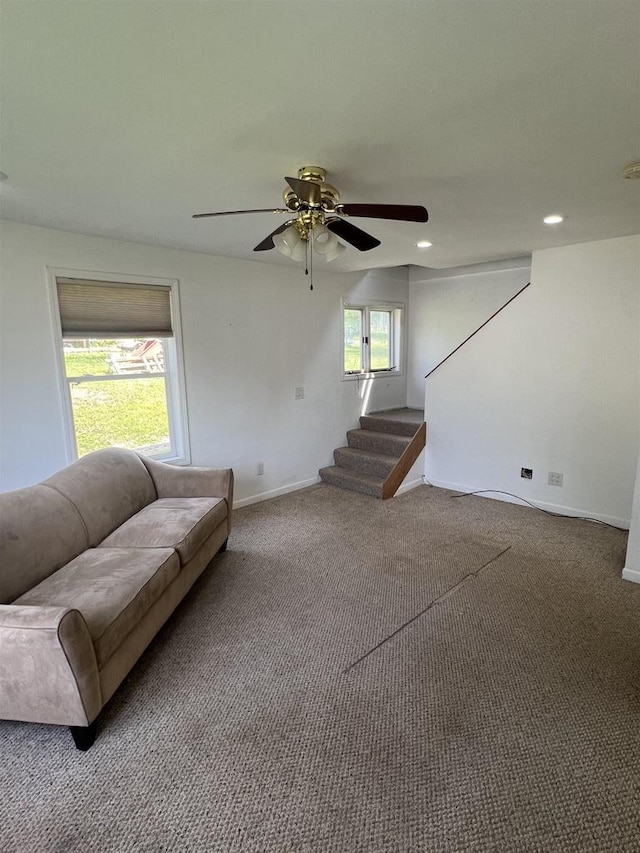 530 Wisconsin St, Columbus, WI 53925 - living area with a ceiling fan, carpet flooring, stairway, and recessed lighting