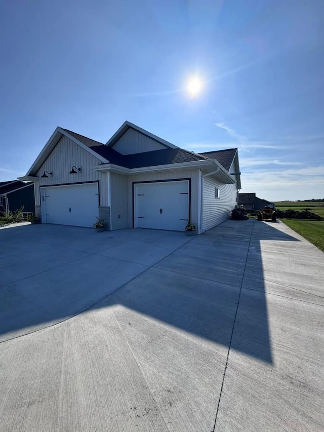 117 Cortland Ave, Casco, WI 54205 - view of front facade with a garage and concrete driveway