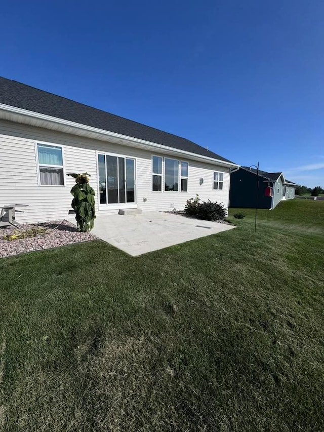 117 Cortland Ave, Casco, WI 54205 - rear view of house with a patio area and a yard
