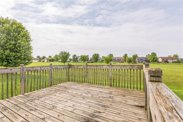 1566 Mallard Ave, Baldwin, WI 54002 - wooden deck with a lawn and a residential view