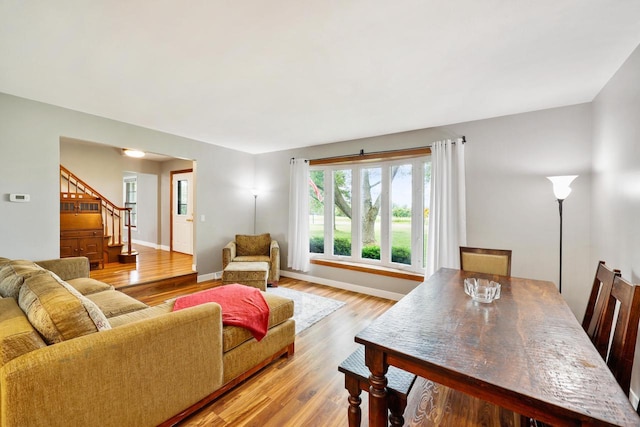 W365N7134 Mcmahon Rd, Oconomowoc, WI 53066 - living room featuring wood finished floors and stairway